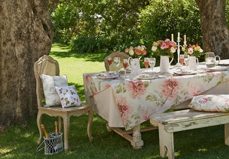 Vintage garden with floral tablecloths